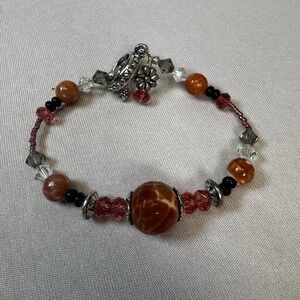 Orange/Peach Tone Beaded Bracelet With Silver Toggle Clasp